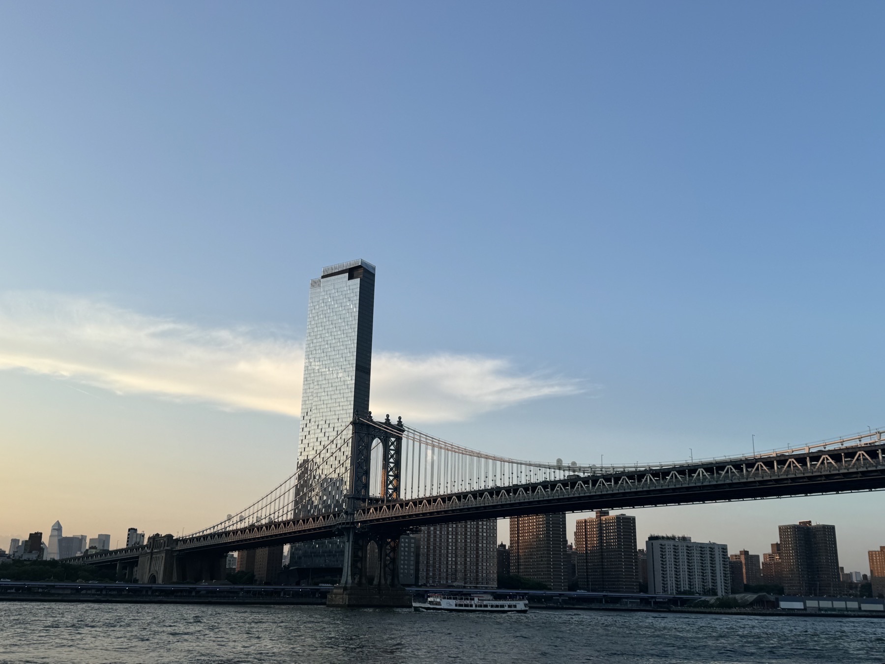 New York skyline and Manhattan Bridge at golden hour